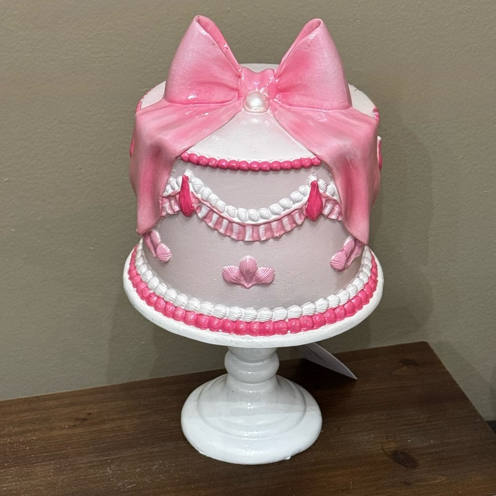 Cupcakes and cashmere pink bow cake